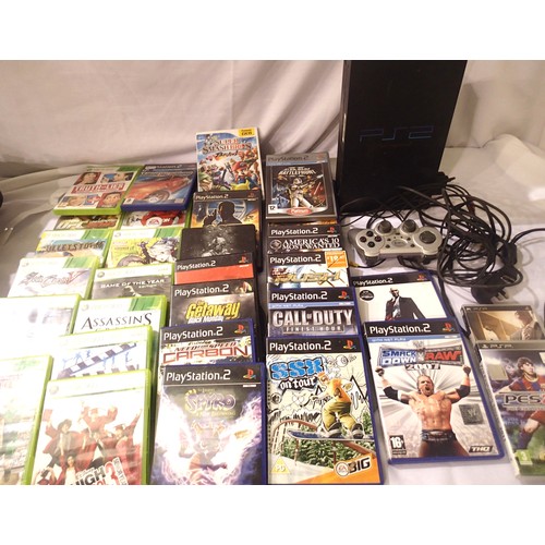 2071 - PlayStation two console with leads and controller with nine PS2 games with disc and instructions and... 