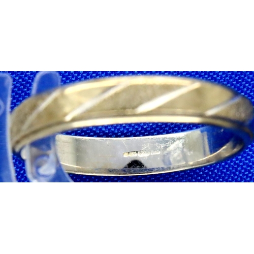 13A - 9ct white gold band ring, size P, 2.2g. P&P Group 1 (£14+VAT for the first lot and £1+VAT for subseq... 