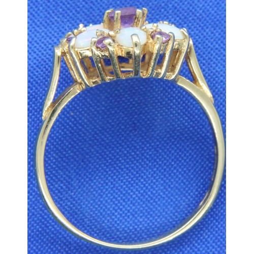 15A - 14ct gold flower head set ring of six opals and seven amethysts, size Q/R, 3.3g. P&P Group 1 (£14+VA... 