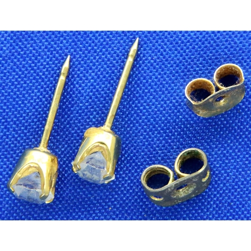 23A - Pair of 9ct gold earring studs with white cut stones, 0.6g. P&P Group 1 (£14+VAT for the first lot a... 