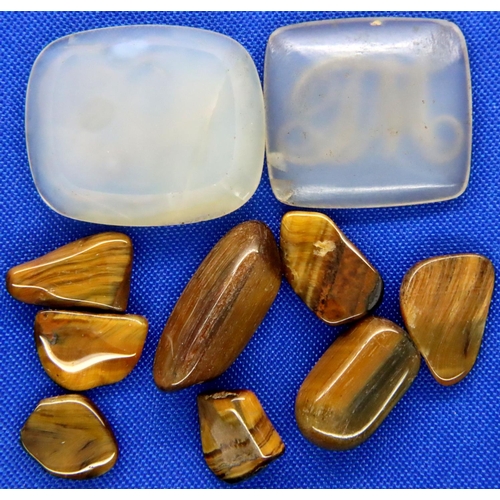 3 - Two loose intaglio seals and a collection of polished tigers eye. P&P Group 1 (£14+VAT for the first... 