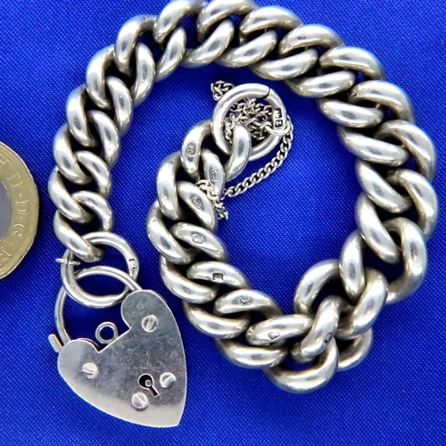 36 - Heavy silver bracelet with padlock clasp, L: 17 cm, 51g. P&P Group 1 (£14+VAT for the first lot and ... 