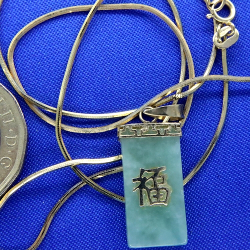 41 - 9ct gold and jade pendant and chain, chain L: 44 cm, combined 4.4g. P&P Group 1 (£14+VAT for the fir... 