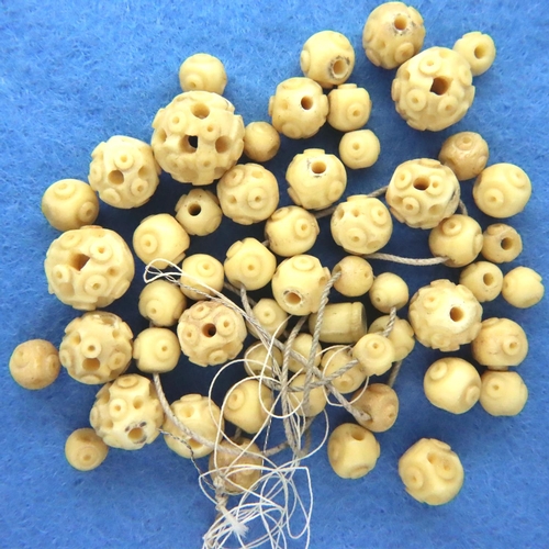 47 - Set of antique carved ivory beads, largest bead D: 12 mm. P&P Group 1 (£14+VAT for the first lot and... 