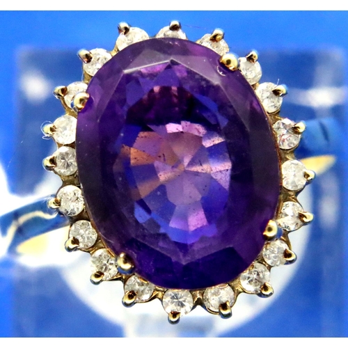 50 - 9ct gold amethyst and diamond ring, size M/N, 3.8g. Some damage to the shank and mount on ring. P&P ... 