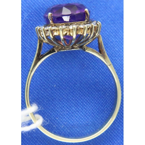 50 - 9ct gold amethyst and diamond ring, size M/N, 3.8g. Some damage to the shank and mount on ring. P&P ... 