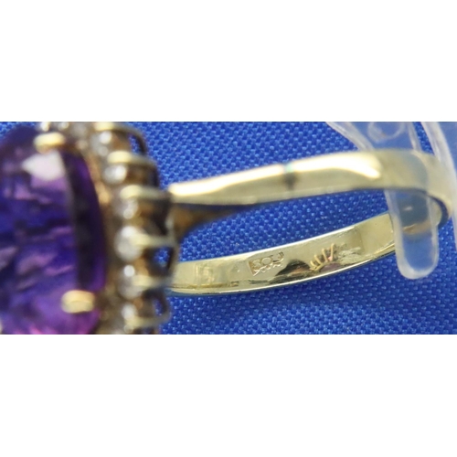 50 - 9ct gold amethyst and diamond ring, size M/N, 3.8g. Some damage to the shank and mount on ring. P&P ... 