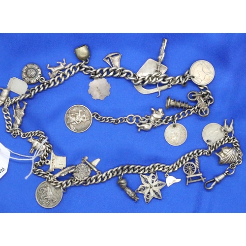 51 - Unusual hallmarked silver charm necklace, (30 charms) chain L: 56 cm, combined 109g. Few charms hall... 