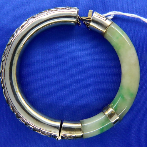 54 - Heavy jade and 925 silver ornate bangle, D: 43 mm, 57g. P&P Group 1 (£14+VAT for the first lot and £... 