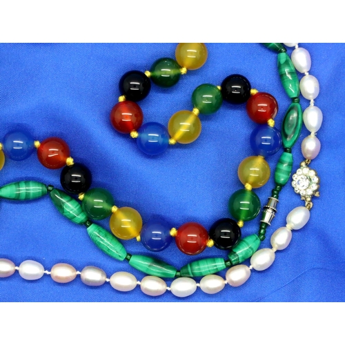 58 - Three necklaces including a pearl and hardstone example. P&P Group 1 (£14+VAT for the first lot and ... 