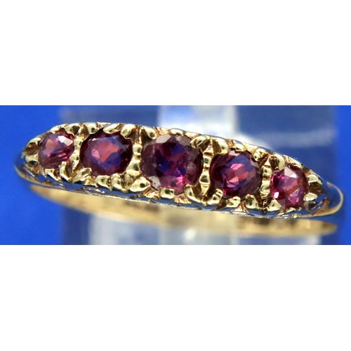 60 - 9ct gold ruby set ring, size S/T, 1.6g. P&P Group 1 (£14+VAT for the first lot and £1+VAT for subseq... 