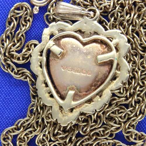 7A - 9ct gold heart shaped locket and a neck chain, 8.8g. P&P Group 1 (£14+VAT for the first lot and £1+V... 