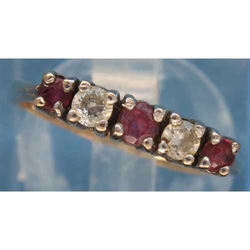 61 - 9ct gold red and white five stone set ring, size I/J, 1.5g. P&P Group 1 (£14+VAT for the first lot a... 