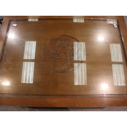 495 - A large Oriental hardwood coffee table carved with inset glass top, 122 x 87 x 46 cm H. Not availabl... 