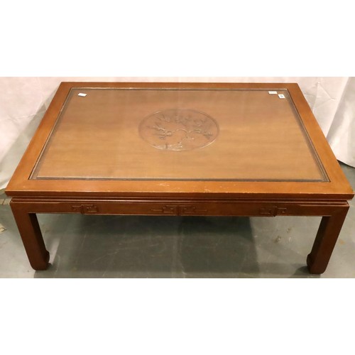 495 - A large Oriental hardwood coffee table carved with inset glass top, 122 x 87 x 46 cm H. Not availabl... 