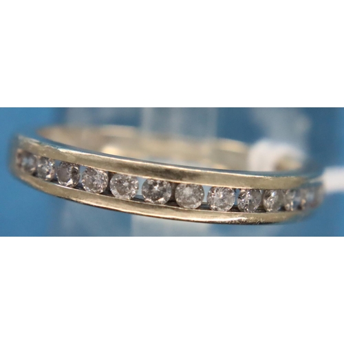 63 - 18ct white gold diamond half eternity ring, size K, 2.6g. P&P Group 1 (£14+VAT for the first lot and... 