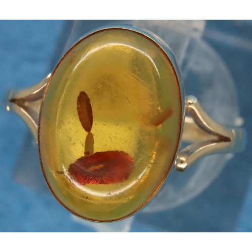 4 - 9ct gold amber set ring, size N, 2.7g. P&P Group 1 (£14+VAT for the first lot and £1+VAT for subsequ... 