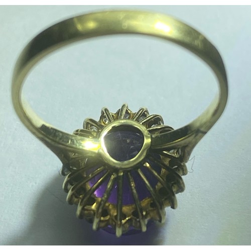 50 - 9ct gold amethyst and diamond ring, size M/N, 3.8g. Some damage to the shank and mount on ring. P&P ... 