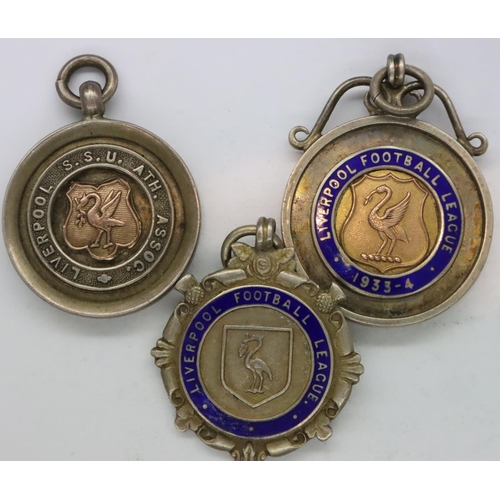 3122 - Liverpool Football League Association: two enamelled silver medal fobs, (1933-4) and a Liverpool SSU... 