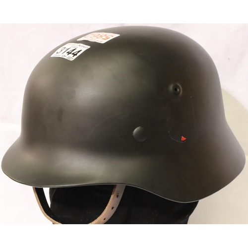 3144 - German WWII replica SS helmet in black with leather liner and chin strap, marked 66 TSR. P&P Group 3... 