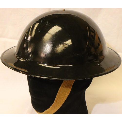 3146 - British WWII Home Front ARP wardens or Police Service helmet in black, with leather liner and one ca... 