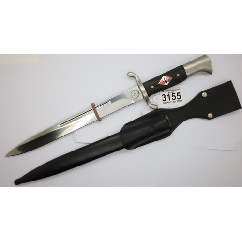 3155 - German Hitler Youth reproduction bayonet with enamelled emblem set into the chequered grip, steel sc... 