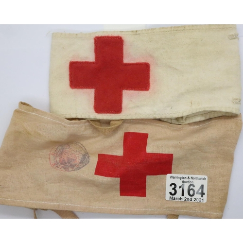 3170 - Imperial German WWI printed tie armband, and a British WWI buttoned cotton armband. P&P Group 1 (£14... 