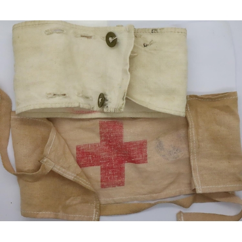 3170 - Imperial German WWI printed tie armband, and a British WWI buttoned cotton armband. P&P Group 1 (£14... 