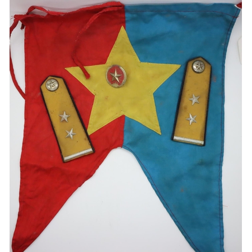 3173 - Vietnam War period NVA anti-aircraft unit shoulder boards, helmet plate and embroidered trumpet bann... 