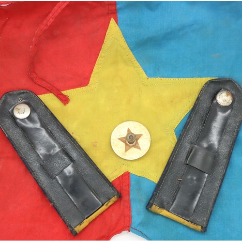 3173 - Vietnam War period NVA anti-aircraft unit shoulder boards, helmet plate and embroidered trumpet bann... 