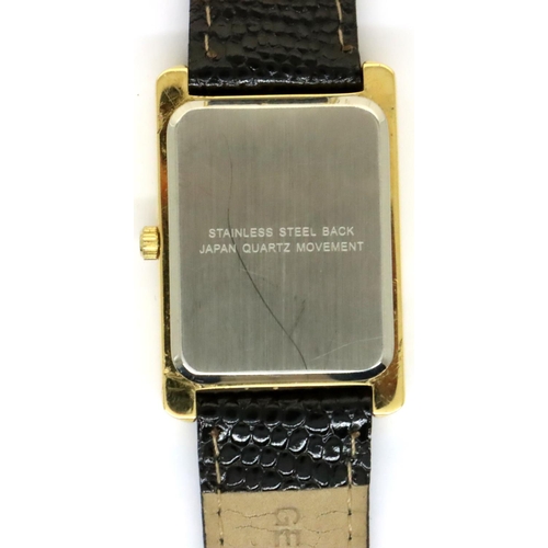 121 - Swiss wristwatch, the black rectangular dial set with a fine gold ingot. P&P Group 1 (£14+VAT for th... 