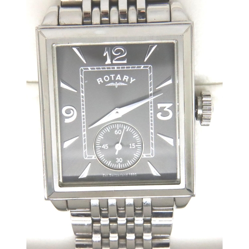 123 - Rotary; two gents wristwatches, one gold plated, the other stainless steel, both require batteries. ... 