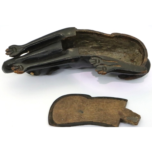 160 - Georgian table snuff box in the form of an ebonised wood reclining dog with bone eyes, L: 12 cm. P&P... 