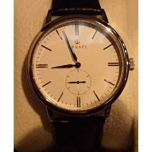 1115 - Ornake; silver and white boxed gents wristwatch, with second hand and leather strap. P&P Group 1 (£1... 