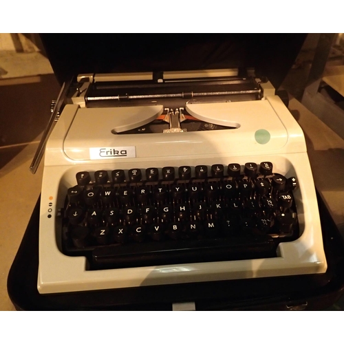 1142 - Cased vintage Erika typewriter. Not available for in-house P&P, contact Paul O'Hea at Mailboxes on 0... 