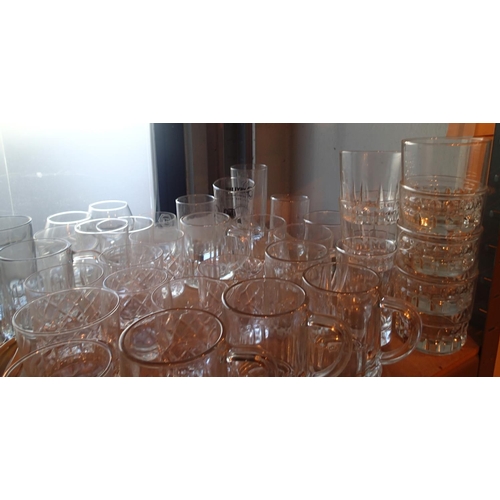 1151 - Shelf of mixed glassware to include whisky tumblers and tankards. Not available for in-house P&P, co... 