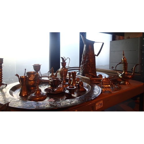 1156 - Collection of mixed brassware to include a large embossed jug. Not available for in-house P&P, conta... 