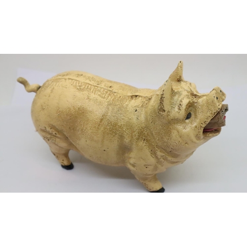 1128A - Cast iron pig moneybox, L: 22 cm. P&P Group 1 (£14+VAT for the first lot and £1+VAT for subsequent l... 