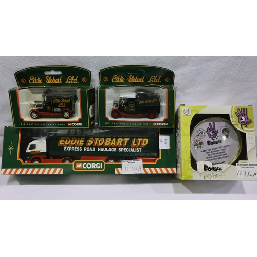 1134A - Three Eddie Stobart boxed vehicles and a Harry Potter Dobble toy. Not available for in-house P&P, co... 