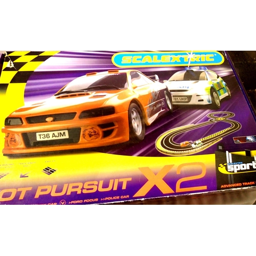 2157 - Scalextric Sport Hot Pursuit set, Ford Focus Police car and Subaru Impreza getaway car, appears comp... 