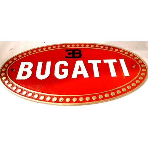 2183 - Cast iron Bugatti sign, L: 35 cms. P&P Group 1 (£14+VAT for the first lot and £1+VAT for subsequent ... 