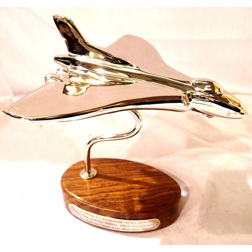 2205 - Chrome Vulcan Bomber on wooden base, W: 19 cm. P&P Group 1 (£14+VAT for the first lot and £1+VAT for... 