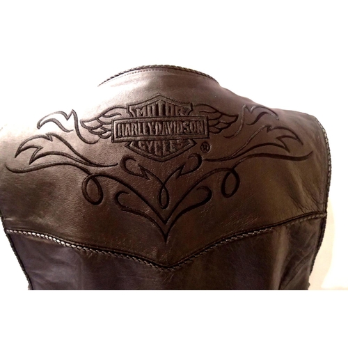 2208 - Ladies Harley Davidson leather jacket and sleeveless jacket, both XL womens and Harley bag, approxim... 