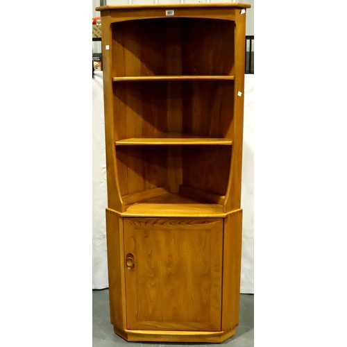 597 - An Ercol elm corner cabinet with two open shelves above a cupboard  base, W: 76 cm, H: 180 cm. Not a... 