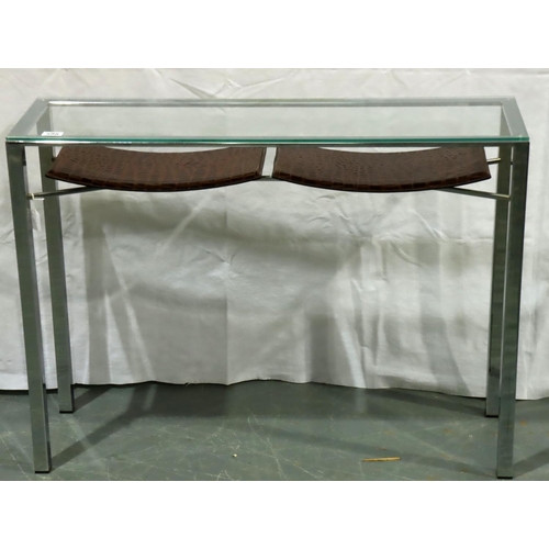 598 - A contemporary glass top console table having a chrome frame and two faux croc shelves beneath, 100 ... 