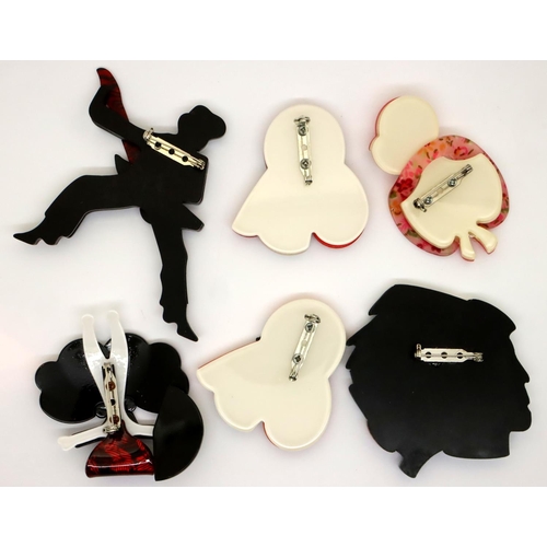 64 - Six Art Deco style brooches to include rocker with guitar example, largest L: 90 mm. P&P Group 1 (£1... 