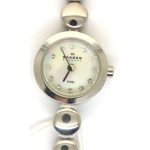 90 - Skagen; ladies wristwatch with mother of pearl face, working at lotting. P&P Group 1 (£14+VAT for th... 