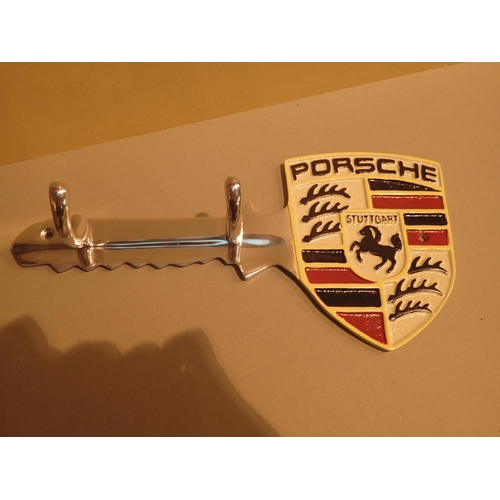 1110 - Cast iron chrome Porsche key shaped wall key holder, L: 30 cm. P&P Group 1 (£14+VAT for the first lo... 