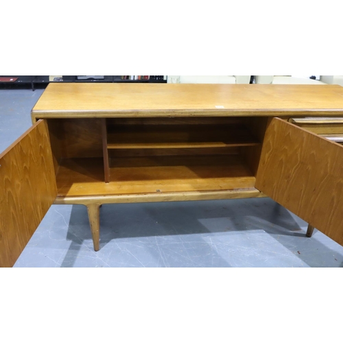 602 - A mid 20th century teak asymmetric sideboard of cupboards and drawers, 147 x 46 x 79 cm H. Not avail... 