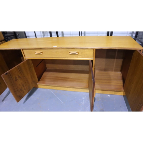 603 - G Plan; a mid 20th century teak sideboard comprising cupboards and single drawer, 186 x 45 x 72 cm H... 